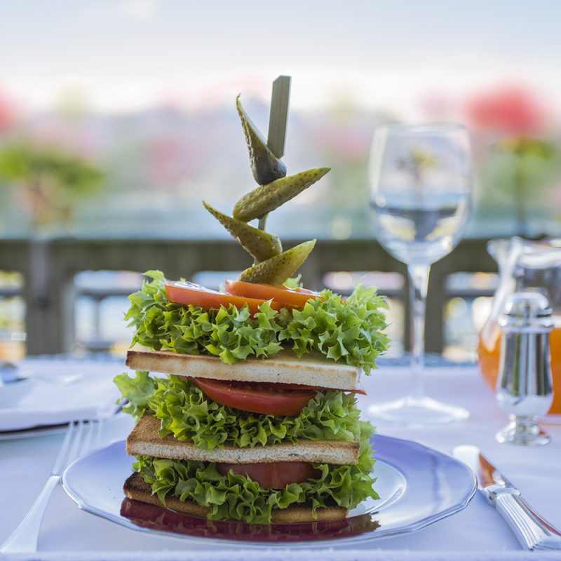 Aperitif on the terrace of our "1900" bar and full-day entrance to the indoor or outdoor pool for two people